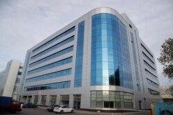 FILE - A business center building known as the "troll factory," an Internet Research Agency, a web of company allegedly controlled by Yevgeny Prigozhin, who has reported ties to Russian President Vladimir Putin, in St. Petersburg, Russia.