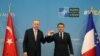 Turkish President Tayyip Erdogan meets with his French counterpart Emmanuel Macron during a bilateral meeting, on the sidelines of the NATO summit, in Brussels, Belgium June 14, 2021. (Murat Cetinmuhurdar/Presidential Press Office/Handout via Reuters)