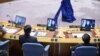 FILE - Shaharzad Akbar (on screens) of the Afghanistan Independent Human Rights Commission addresses a Security Council meeting, Aug. 6, 2021. She again spoke at the U.N. on Sept. 24, 2021, urging global leaders to pressure the Taliban to let girls go to school.