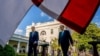Biden, Japan's Suga Commit to Work Together to Meet China Challenge 