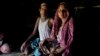 Rohingya Muslim man Sultan Mehmood, 62, and his wife, Haseena Begum, 45, sit for a photograph inside their shelter near Balukhali refugee camp, Bangladesh. The couple stayed in their hometown when violence broke out last month in Myanmar. That decision left the couple open to attack. “She was raped by three soldiers while I was mercilessly beaten up,” Mehmood said, sighing deeply.