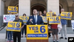 FILE - Carl DeMaio, who is leading the Proposition 6 campaign to repeal a recent gas tax increase, discusses a ballot measure he is proposing to provide money for road repairs and eliminate high-speed rail in Sacramento, Calif., Sept. 25, 2018.