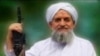 FILE PHOTO: A photo of Al Qaeda leader Ayman al-Zawahiri is seen in this still image taken from a video