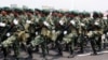 Female soldiers march in a parade in celebration of Congo’s 50th anniversary of independence, Kinshasa, Congo, Wednesday, June 30, 2010.