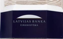 Latvian central bank sign is seen on the bank's headquarters in Riga, April 9, 2019.