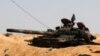 Gadhafi Forces Pound Rebel Positions in Ajdabiya, Continue Siege of Misrata