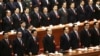 Leading party members including outgoing president Hu Jintao, (3rd left), stand singing of the Internationale, the international communist anthem, at the closing ceremony of the 18th Communist Party Congress held at the Great Hall of the People in Beijing