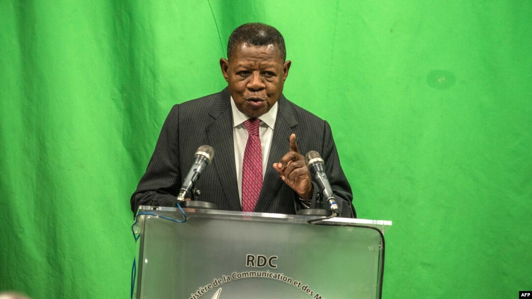 FILE - DRC government spokesperson Lambert Mende speaks in Kinshasa, Aug. 8, 2018.