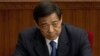 In this March 11, 2012 photo, then Chongqing party secretary Bo Xilai attends a plenary session of the National People's Congress at the Great Hall of the People in Beijing.
