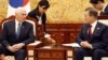 U.S. Vice President Mike Pence, left, speaks with South Korean President Moon Jae-in during a meeting at the presidential office Blue House in Seoul, Feb. 8, 2018. 