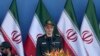 FILE - In this Sept. 21, 2016 file photo, Chief of Staff of Iran's Armed Forces, General Mohammad Hossein Bagheri delivers a speech during a military parade. On May 8, 2017, Bagheri was quoted as saying soldiers will attack terrorists wherever they are, suggesting they could go over the border into Pakistan to target militants there. The report comes after an attack claimed by the Sunni militant group Jaish-ul-Adl killed 10 soldiers in April. 