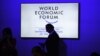 Participants and visitors arrive at the India Economic Summit, hosted by the World Economic Forum, in New Delhi on October 6, 2017.