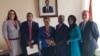 Chief of Mission Natalie E. Brown, far left, and Deputy Chief of Mission Stephen Bank, far right, pose with Rep. Joe Neguse, Rep. Karen Bass, Eritrean Minister of Foreign Affairs Osman Saleh and Rep. Ilhan Omar. The members of Congress were on an official visit to Eritrea.
