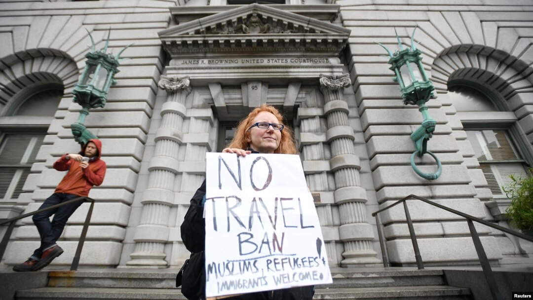 FILE - Beth Kohn protests against U.S. President Donald Trump's executive order outside the 9th U.S. Circuit Court of Appeals courthouse in San Francisco, California, Feb. 7, 2017.