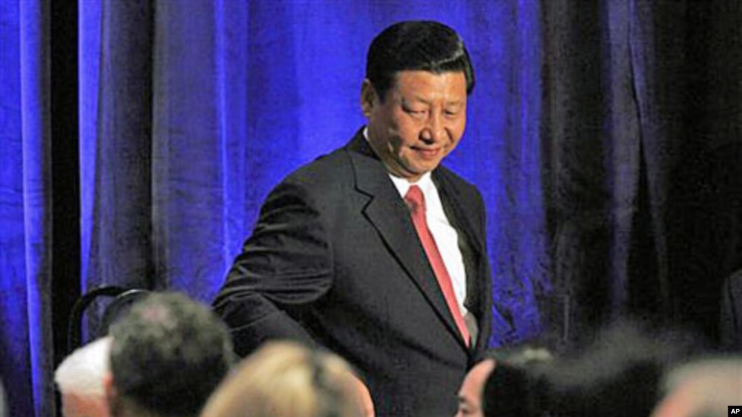 China's Vice President Xi Jinping leaves the stage after speaking to the US-China Business Council in Washington, February 15, 2012.
