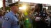 FILE - Minneapolis Police Chief Brian O'Hara talks with Michael Wilson on the third anniversary of George Floyd's death, May 25, 2023. A group of U.N. human rights experts formed after Floyd's death submitted a report about the U.S. criminal justice system on Oct. 5, 2023.
