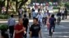 FILE - Employees of Infosys Technologies, the Indian technology outsourcing giant, are seen at the company headquarters in Bangalore, India, Jan. 11, 2013.
