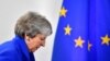 FILE - Britain's Prime Minister Theresa May arrives for a news conference in Brussels, Belgium, Nov. 25, 2018. 