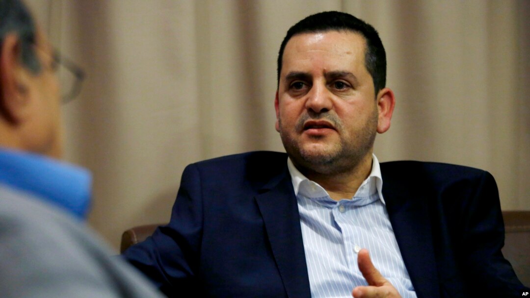 Abdelhadi al-Houij (Lahouij), Haftar's Minister of Foreign Affairs, speaks during an interview with The Associated Press, Sunday, April 21, 2019, in Tunis, Tunisia.