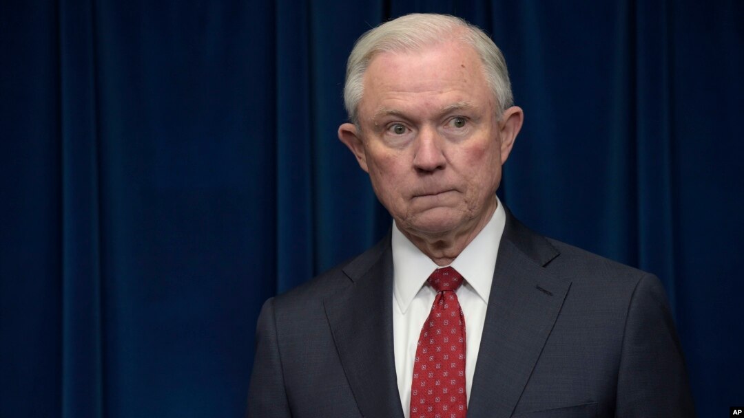 FILE - Attorney General Jeff Sessions waits to make a statement at the U.S. Customs and Border Protection office in Washington, March 6, 2017.