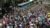Iranian protesters shout slogans during a demonstration in central Tehran on June 25, 2018. Traders in the Iranian capital's Grand Bazaar held a rare protest strike against the collapse of the rial on the foreign exchange market.