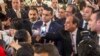 Egyptian President Abdulfattah Al-Sisi greets Coptic women at entrance of new Coptic Cathedral in Egypt, Jan 6, 2018. (H. Elrasam / VOA)
