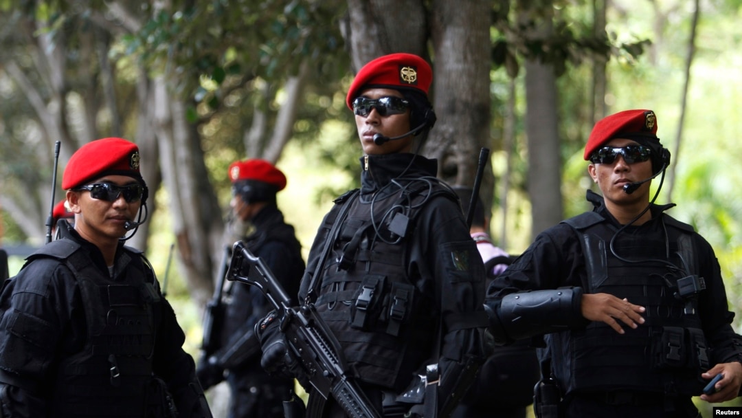 FILE - Indonesian Army's Kopassus special forces patrol outside the venues of the Asia-Pacific Economic Cooperation (APEC) Summit in Bali, Oct. 5, 2013. 