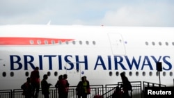 FILE - British Airways' new Airbus A380 arrives at a hanger after landing at Heathrow airport in London July 4, 2013.