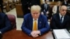 TOPSHOT - Former US President Donald Trump attends his trial for allegedly covering up hush money payments linked to extramarital affairs, at Manhattan Criminal Court in New York City, on May 2, 2024.