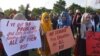 Students display placards during a demonstration demanding for reinstatement of student unions, education fee cuts and batter education facilities, in Islamabad on Nov. 29, 2019.