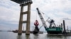 Nuevo canal permite paso de barco tras derrumbe de puente en Baltimore 