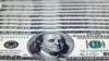 FILE - US Hundred dollar notes.