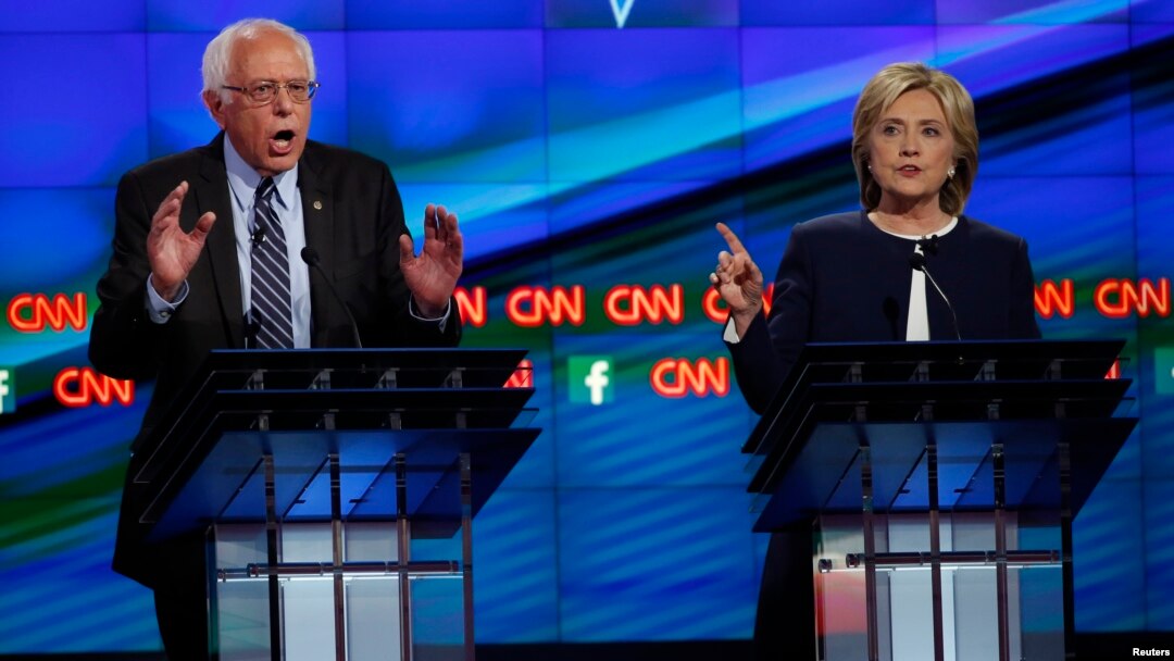U.S. Senator Bernie Sanders debates former Secretary of State Hillary Clinton during the first official Democratic candidates debate of the 2016 presidential campaign in Las Vegas, Oct. 13, 2015.