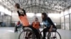 Disabled Afghan women play basketball at the Orthopaedic Center of the International Committee of the Red Cross in Kabul, Afghanistan, Feb. 7, 2020. 