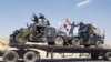 Thousands Flee as Iraq Steps Up Airstrikes on IS-held Town