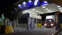 In this photo released on Nov. 6, 2019, an Iran truck containing a cylinder of uranium hexafluoride gas leaves Ahmadi Roshan uranium enrichment facility in Natanz.