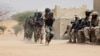 FILE - Nigerien special forces and Chadian troops participate with U.S. advisers in the Flintlock exercise in Mao, Chad, March 7, 2015.