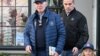 FILE - U.S. President Joe Biden, accompanied by Hunter Biden and Beau Jr., walks out of a bookstore in downtown Nantucket, Massachusetts, November 29, 2024.