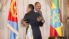 Ethiopian Prime Minister Abiy Ahmed and Eritrean President Isaias Afwerki embrace at the declaration signing in Asmara, Eritrea, July 9, 2018, in this photo obtained from social media. (Ghideon Musa Aron Visafric/via Reuters)