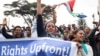 FILE - Eritrean exiles rally in front of the African Union headquarters, responding to a U.N. report highlighting human rights violations in Eritrea, in Addis Ababa, Ethiopia, June 26, 2015.
