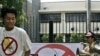 Activists of Greenpeace dance outside the Ghana embassy to congratulate the Ghana embassy staff on the 'banning of the light bulb' in Ghana, in New Delhi (File)