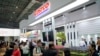 美国最大的连锁会员制仓储量贩店Costco(开市客)的标识出现在上海会议中心举行的中国国际进出口博览会上。（2018年11月5日）