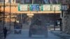 FILE - Russian soldiers in armored vehicles patrol a street in Aleppo, Syria, Feb. 2, 2017.