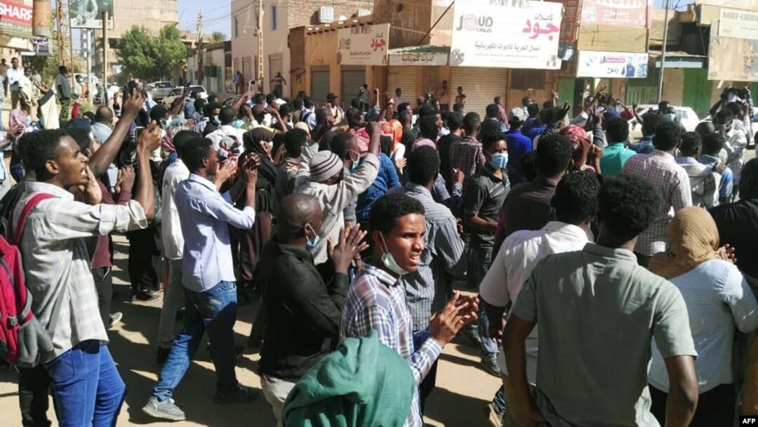 Sudanese protesters chant slogans during an anti-government demonstration in the capital Khartoum, Jan. 6, 2019.