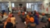 Amrita Bamrah, Policy Director of SALDEF, addresses attendees of the "SALDEF Wears Orange" Event. 