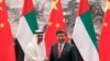 Abu Dhabi's Crown Prince Sheikh Mohammed bin Zayed Al Nahyan shakes hands with Chinese President Xi after witnessing a signing ceremony in Beijing, July 22, 2019.