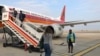 Aeroporto de voos domésticos em Luanda, avião da TAAG. Angola