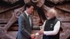 FILE - Indian Prime Minister Narendra Modi and Canada Prime Minister Justin Trudeau in New Delhi, Sept. 9, 2023. The two have denounced the violence that erupted Sunday at several locations in suburban Toronto, including a Hindu temple.