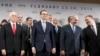 FILE - U.S. Vice President Mike Pence, PM of Poland Mateusz Morawiecki, Israeli PM Benjamin Netanyahu and U.S. Secretary of State Mike Pompeo, from left, stand on a podium at a conference on Peace and Security in the Middle East in Warsaw, Poland.