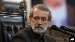 Parliament Speaker Ali Larijani gives a press conference in Tehran, Iran, Dec. 1, 2019.